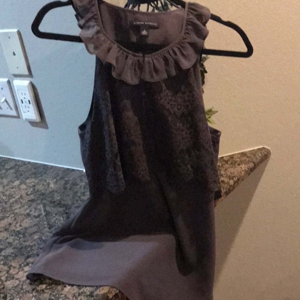 Beautiful grey sleeveless with shell lining